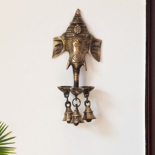 Gleeful Ganesha Hand-Etched Decorative Wall Hanging Diyas With Bells In Brass (500 grams) Gleeful Ganesha Hand-Etched Decorative Wall Hanging Diyas With Bells In Brass (500 grams)