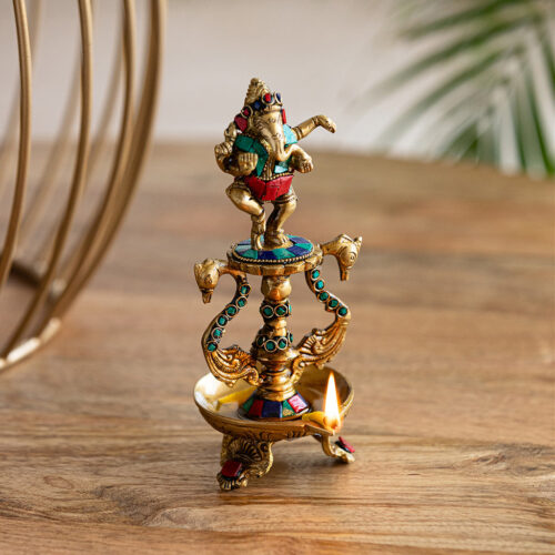 Handcarved 'Ganesha' Brass Diya With Gem Work (1 Wick, 20.1 cm, 20 ml, 800 grams, Hand-Etched) Handcarved 'Ganesha' Brass Diya With Gem Work (1 Wick, 20.1 cm, 20 ml, 800 grams, Hand-Etched)