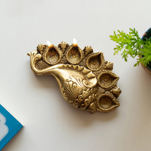 'Shankh' Brass Diya In Brass (5 Wicks, 755 grams, Hand-Etched) 'Shankh' Brass Diya In Brass (5 Wicks, 755 grams, Hand-Etched)
