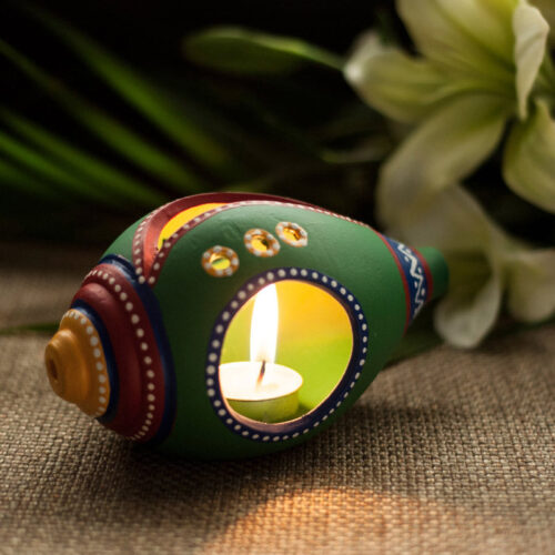 Terracotta Handpainted Shankh Shaped Table Tea Light Holder Terracotta Handpainted Shankh Shaped Table Tea Light Holder